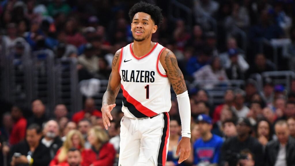 Anfernee Simons showing his trademark explosive dunk during a Blazers game — the rising star is turning talent into millions.