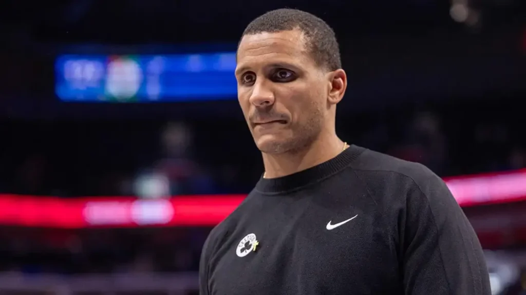 Joe Mazzulla strategizing during a Celtics game — leading Boston to their 18th NBA championship in 2024."
