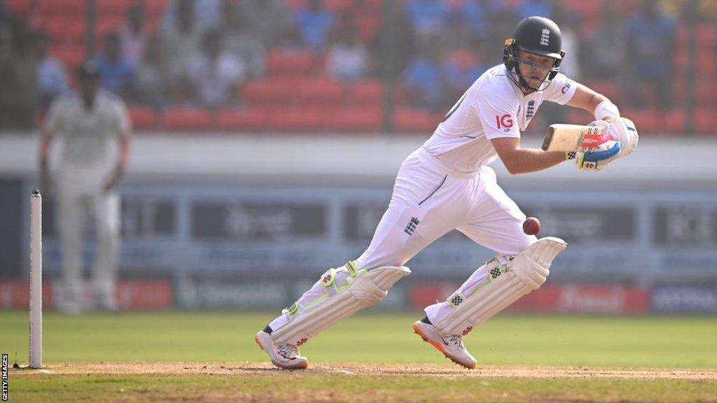 Ollie Pope celebrating a classy century — a moment of pure elegance on field and in his financial stride.