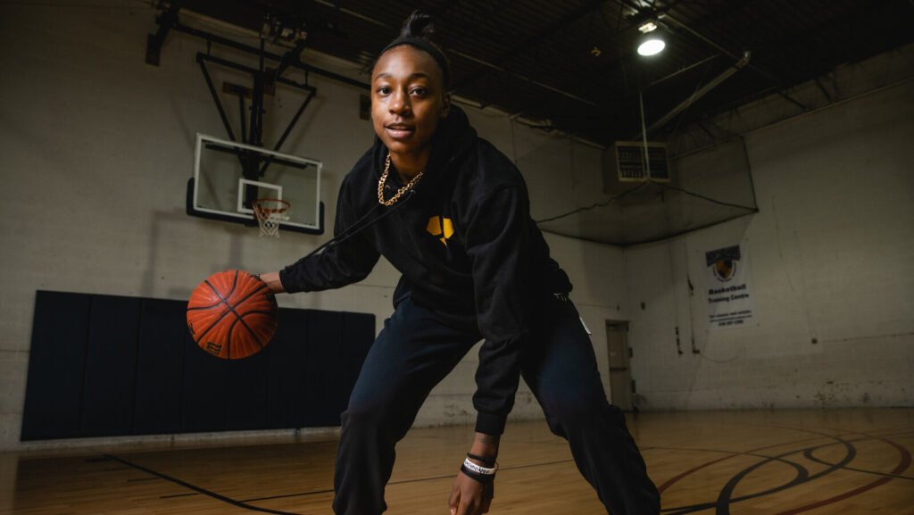 Jewell Loyd in her new Aces jersey—her 2025 move to Las Vegas marks a fresh chapter in her rising financial journey.

