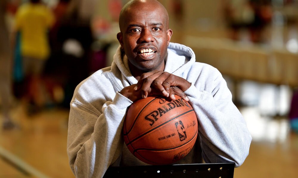 Kenny McFadden coaching young athletes at the Hoop Club in Wellington, exemplifying his commitment to nurturing future basketball talent.