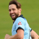 Chris Woakes bowling with trademark precision — the ‘Wizard’ whose off-field earnings match his on-field magic.