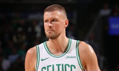 Kristaps Porziņģis in Celtics green — now heading to Atlanta in a dramatic three-team NBA trade.