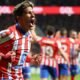 Giuliano Simeone celebrates a goal for Atlético Madrid, marking his ascent as one of football's promising talents