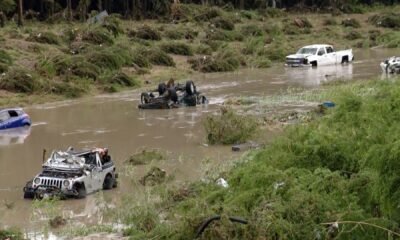 Rescue teams in San Antonio battle rising floodwaters as submerged vehicles mark the deadly aftermath of Thursday’s early morning floods.