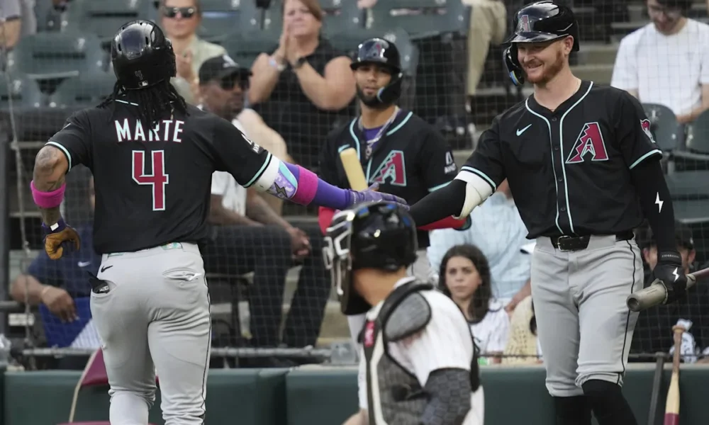 Arizona Diamondbacks’ Ketel Marte wipes away tears on the field after a fan’s cruel remark about his late mother sparks emotional breakdown.