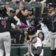 Arizona Diamondbacks’ Ketel Marte wipes away tears on the field after a fan’s cruel remark about his late mother sparks emotional breakdown.