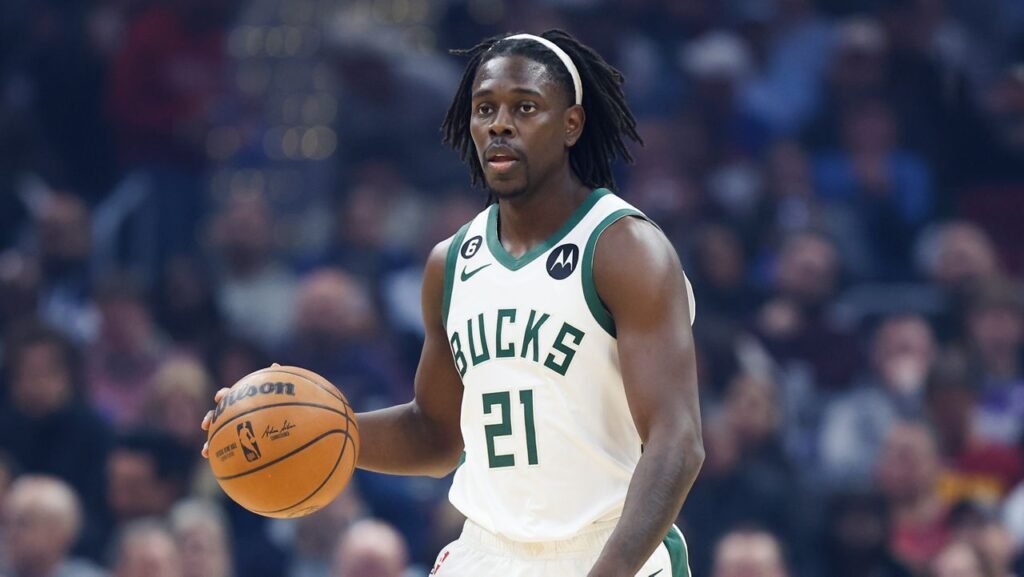 Jrue Holiday during a game in the 2024 NBA Finals, showcasing his defensive prowess and leadership on the court.