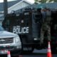 SWAT teams and emergency responders gather at Canfield Mountain in Idaho after two firefighters were killed in a sniper ambush amid a wildfire.