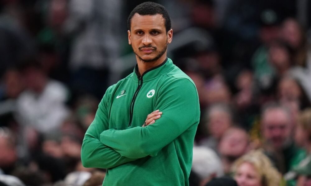 Joe Mazzulla strategizing during a Celtics game — leading Boston to their 18th NBA championship in 2024.