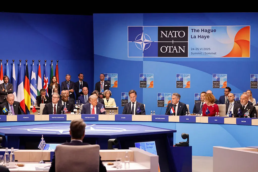 NATO leaders gather for a high-stakes summit on defense spending as China issues strong warnings against “escalatory militarism.”