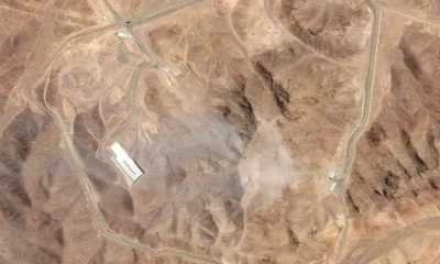 Aerial view reveals the aftermath at Iran’s Fordow nuclear facility—new satellite photos show structures obliterated following the US military’s massive stealth bombing strike.