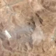 Aerial view reveals the aftermath at Iran’s Fordow nuclear facility—new satellite photos show structures obliterated following the US military’s massive stealth bombing strike.