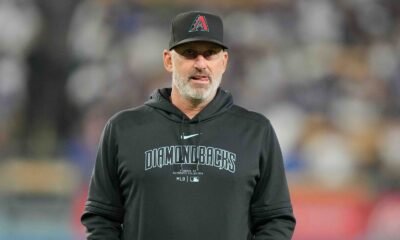 Torey Lovullo leading the Diamondbacks dugout—earning $5 million a year and turning Arizona into a contender.
