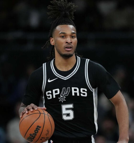 Stephon Castle (#5) celebrating after Ricky scoring that clinched his 2025 NBA Rookie of the Year title—living the dream on and off the court.