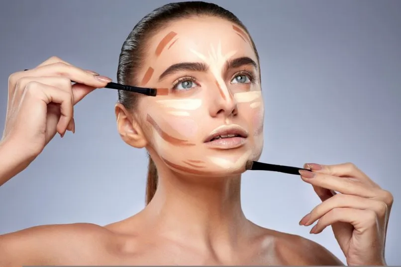 A glowing model showcases 2025’s viral “soft halo blush” trend — where elegance meets effortless radiance.