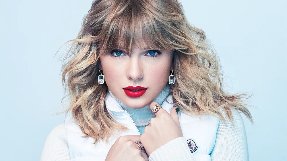 Taylor Swift performing during The Eras Tour, the record-breaking tour that helped propel her into billionaire status.