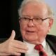 Warren Buffett at a Berkshire Hathaway annual meeting — the legendary investor has now donated over $56 billion to charity.
