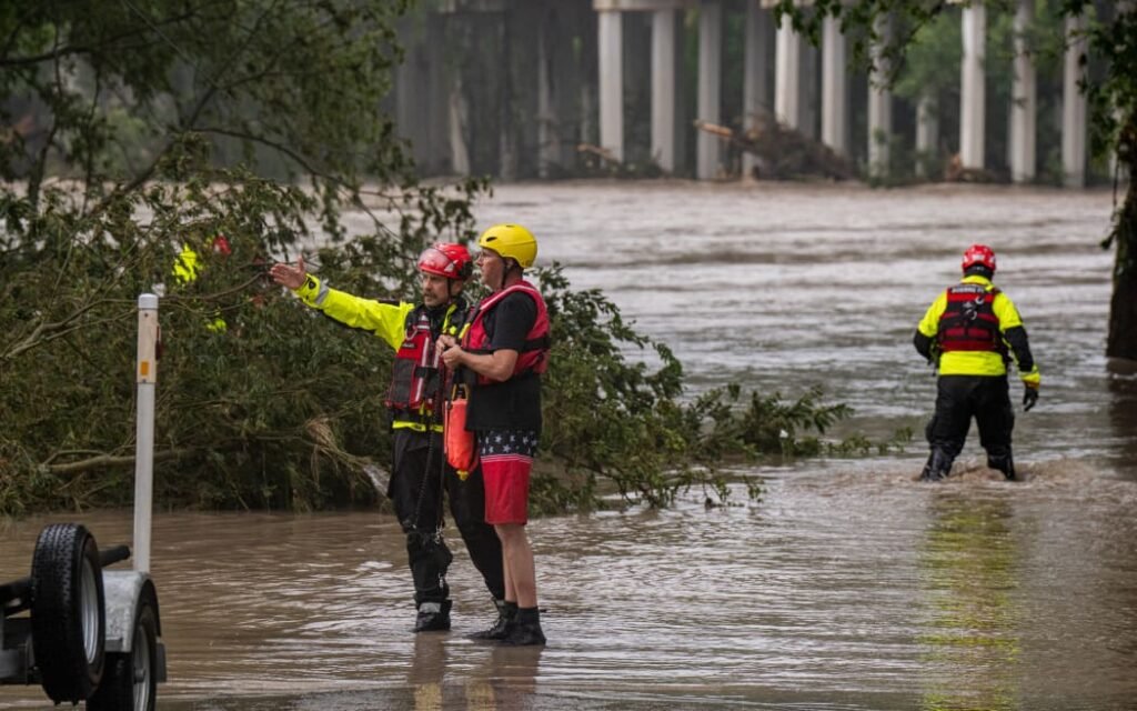 Emergency responders scan the flooded Guadalupe River banks as search for missing children continues in Kerr County, Texas.


