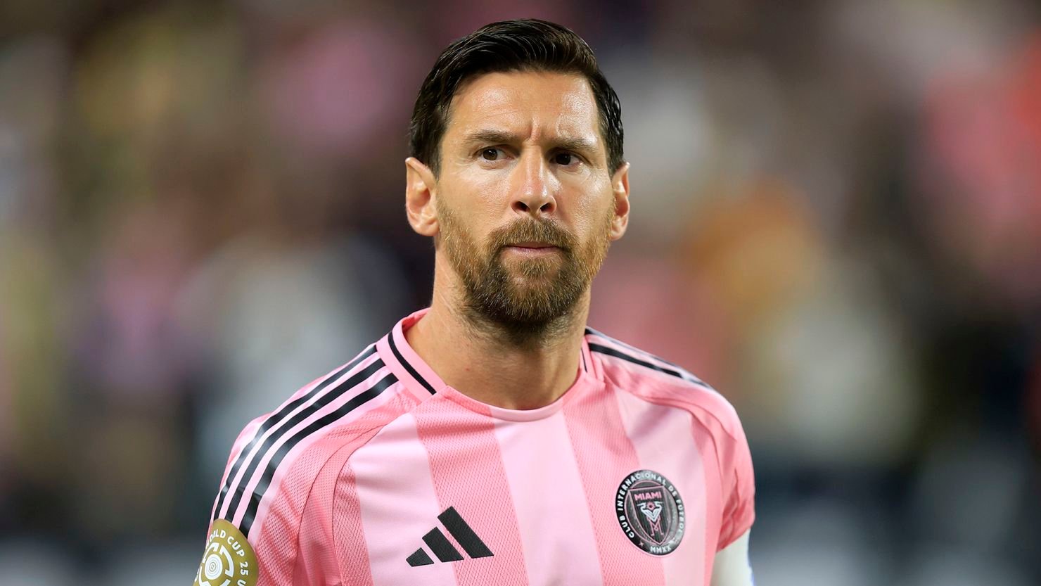 Lionel Messi looks dejected as PSG celebrate their fourth goal during a dominant 4-0 victory over Inter Miami at the Club World Cup.