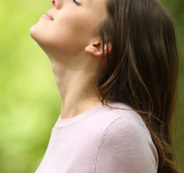 Profile,Of,A,Relaxed,Woman,Breathing,Fresh,Air,In,A