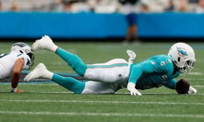 Broadcaster Eric Collins delivers an unforgettable play-by-play performance during the Panthers vs. Dolphins clash, earning praise as one of the most exciting new voices in the NFL.