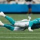 Broadcaster Eric Collins delivers an unforgettable play-by-play performance during the Panthers vs. Dolphins clash, earning praise as one of the most exciting new voices in the NFL.