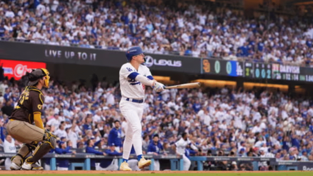 Kiké Hernández celebrates after his game-saving double play seals the Dodgers’ 3–1 win over the Blue Jays, forcing a Game 7 in the World Series.