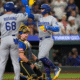 Kiké Hernández celebrates after his game-saving double play seals the Dodgers’ 3–1 win over the Blue Jays, forcing a Game 7 in the World Series.