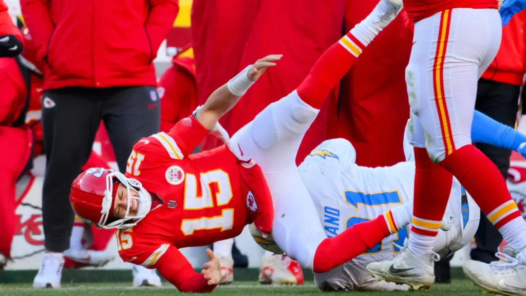 Patrick Mahomes reacts after suffering a season-ending knee injury during NFL Week 15