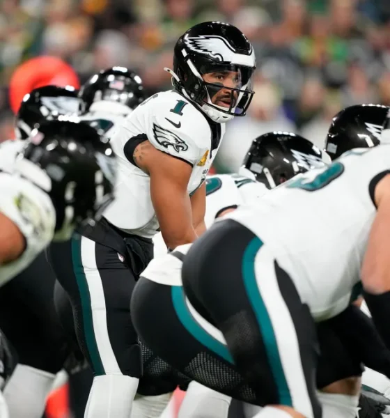 Eagles defenders celebrate after completing a historic 31–0 shutout of the Raiders
