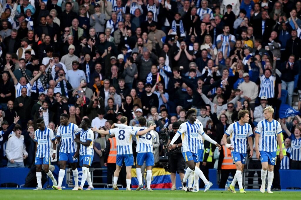 Liverpool and Brighton players line up at Anfield ahead of a high-intensity Premier League clash