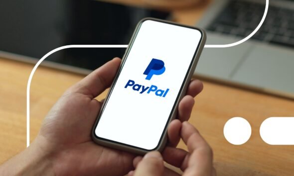 PayPal logo on phone and laptop.